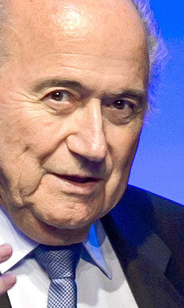 Sepp Blatter challenges critics to risk taking him on